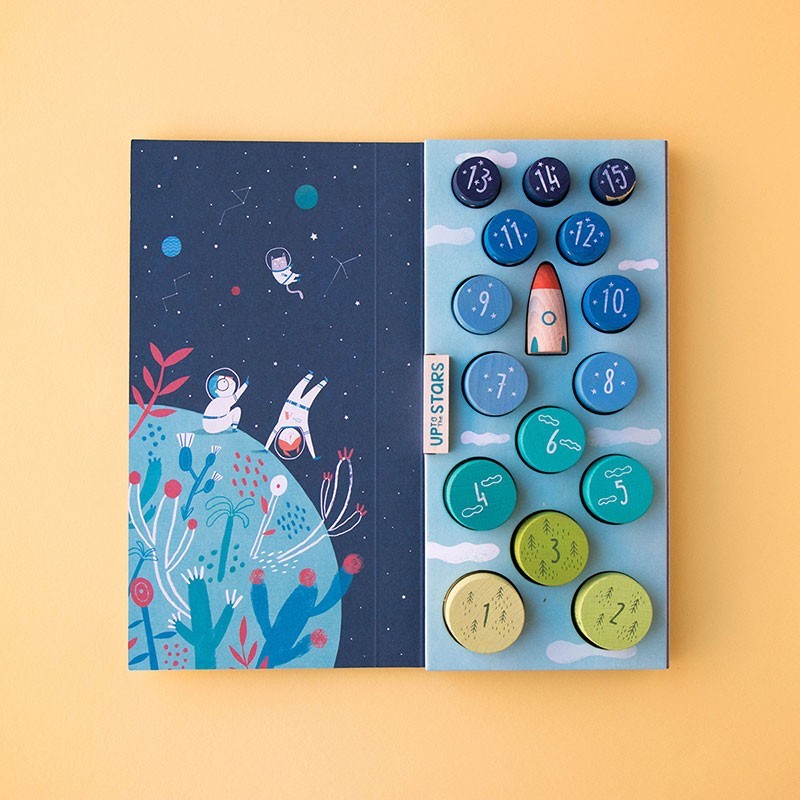 Game with space-themed design and colorful objects on a yellow background
