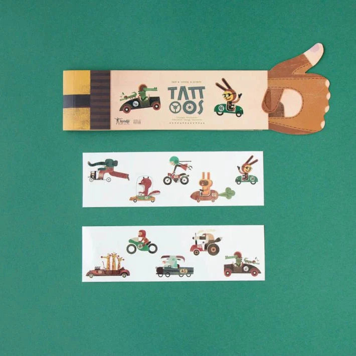 tattoo set with packaging on a green background