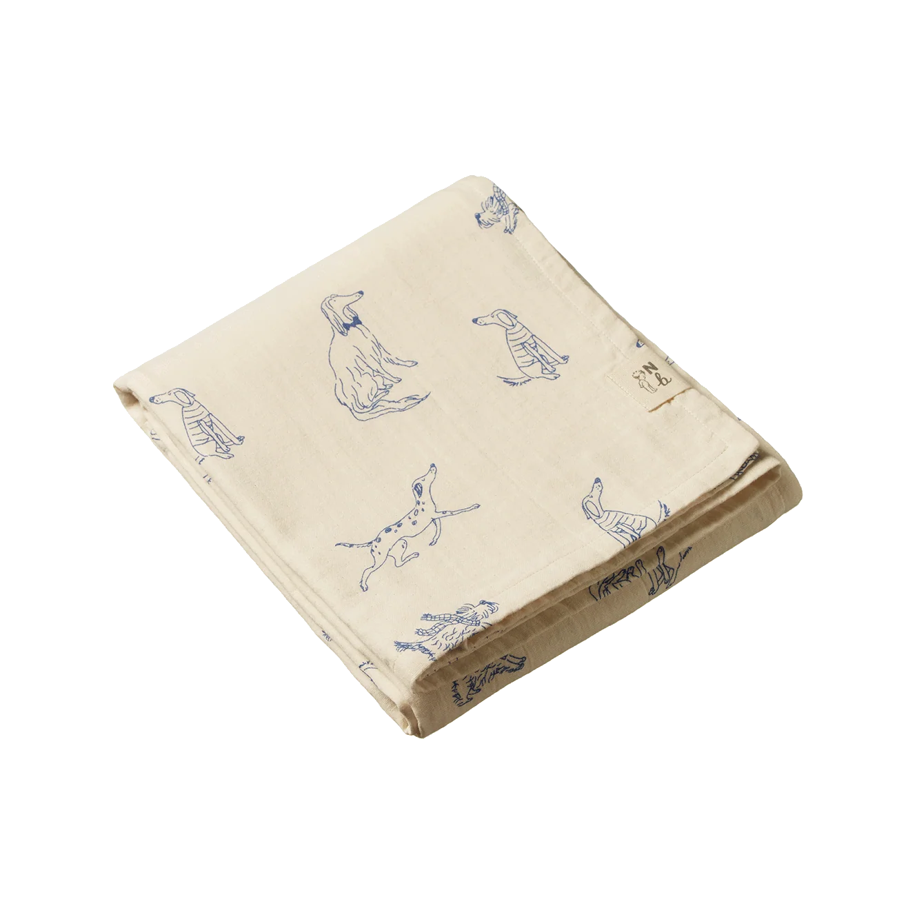 Beige blanket with blue dog illustrations on a white background