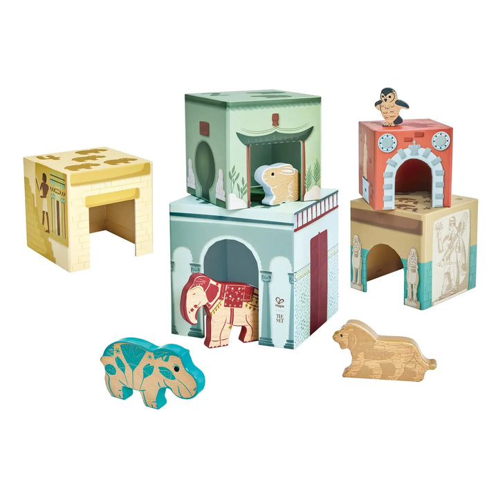 Set of wooden toy blocks with animal figures on a white background