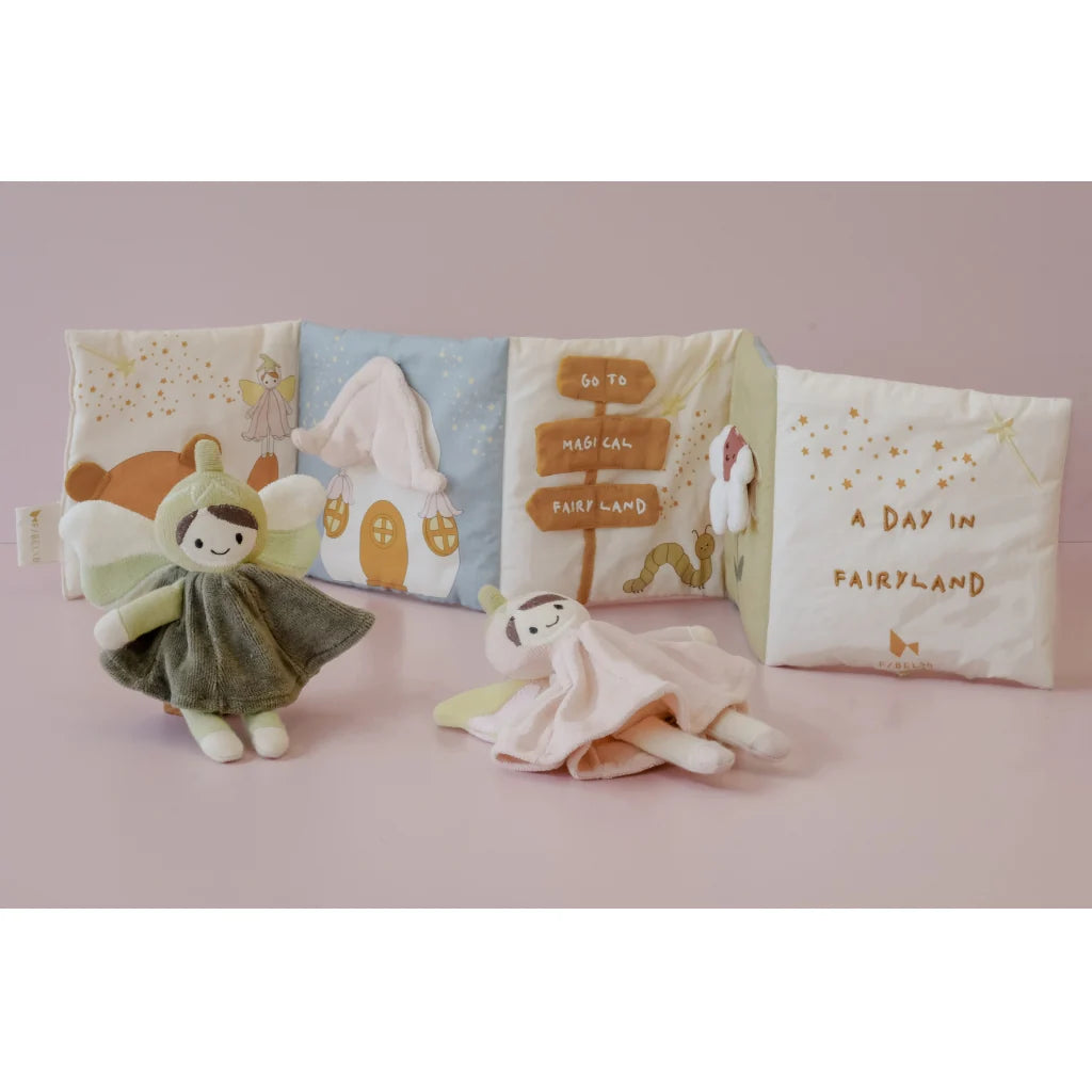 Set of children's fairy dolls with fairy-themed design on a pink background