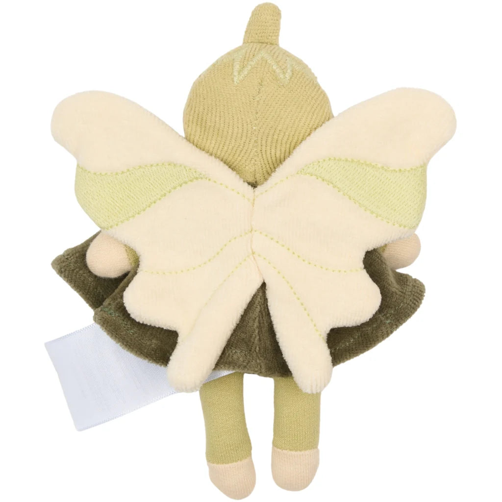Plush fairy toy with green dress and beige wings on a white background