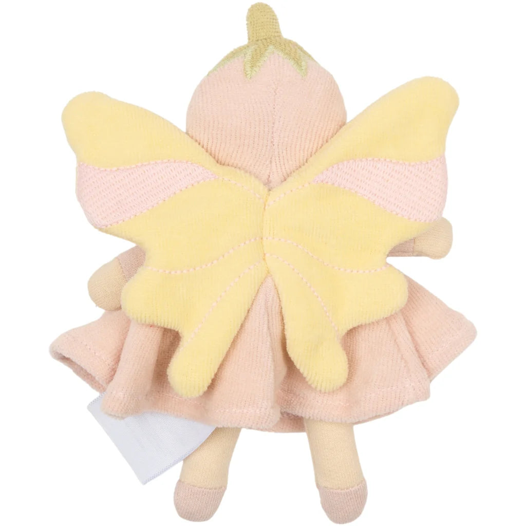 Plush toy fairy with pink dress and yellow wings on a white background