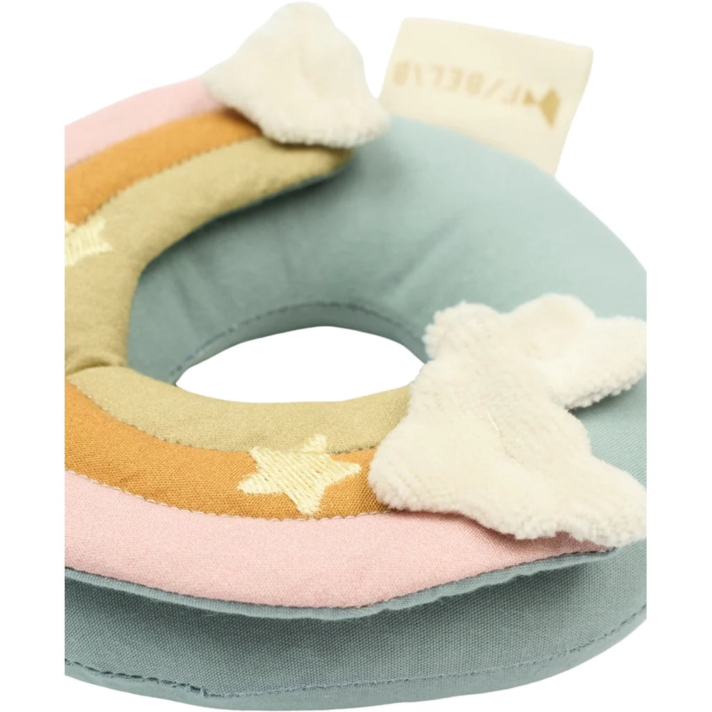 Colorful baby rattle ring with soft texture on a white background