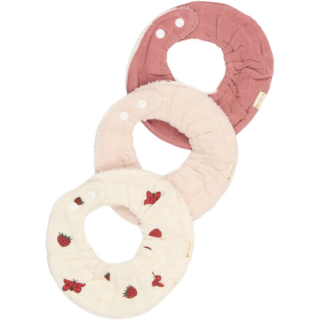 Three soft baby bibs with different designs on a white background