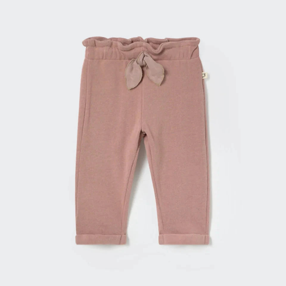 Pink baby pants with drawstring on a white background