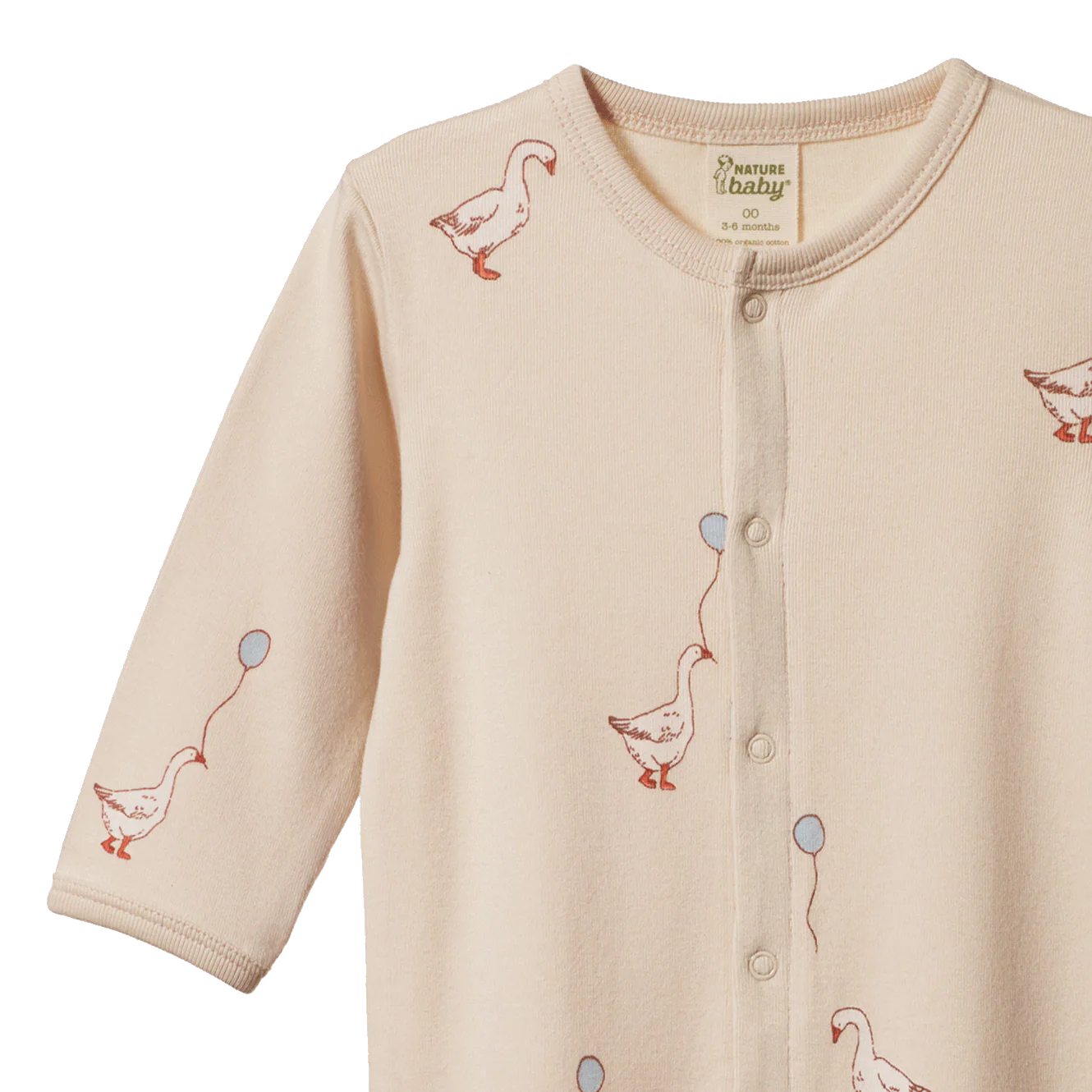 Beige baby one piece with duck designs on a white background