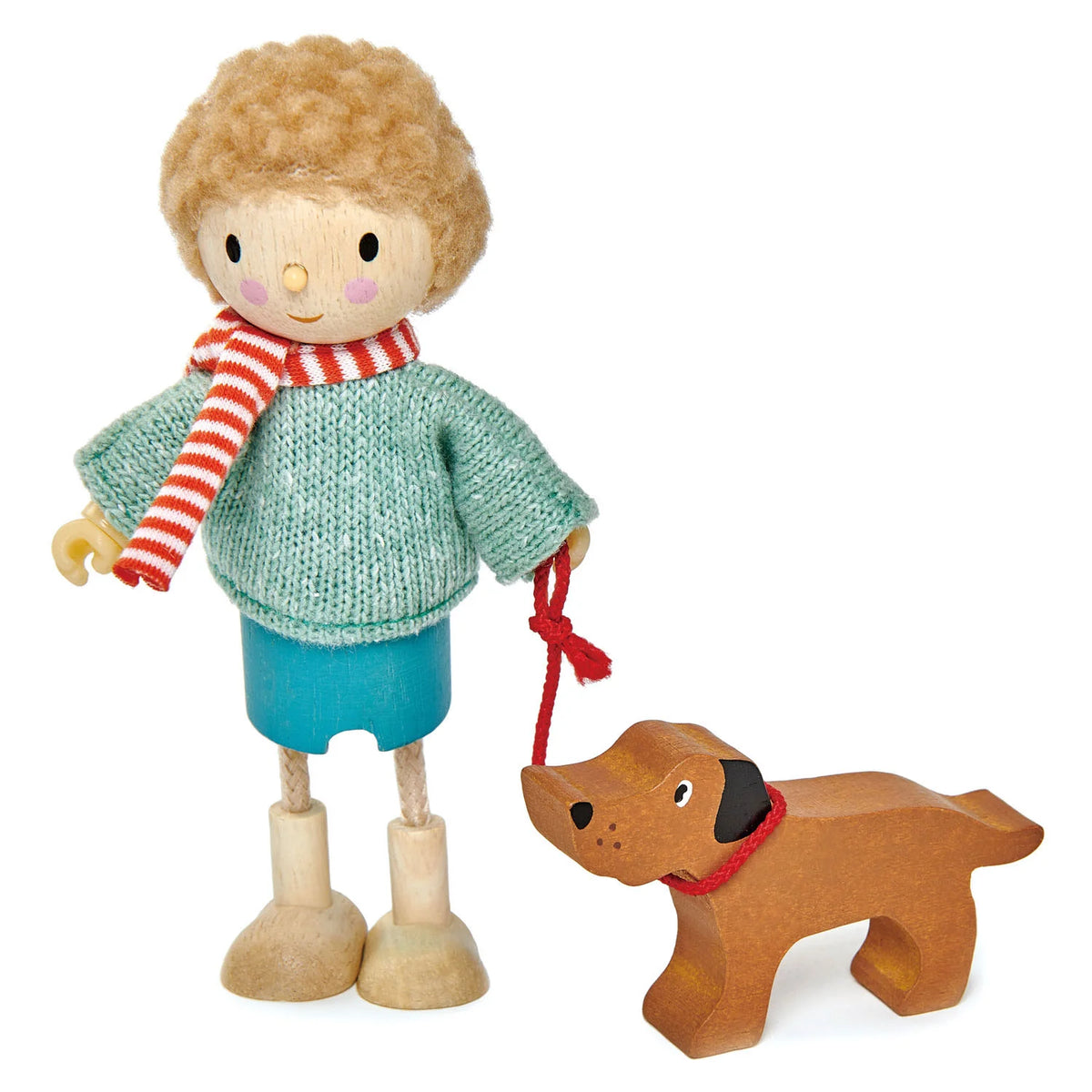 Wooden toy figure with a striped scarf and a wooden dog on a white background