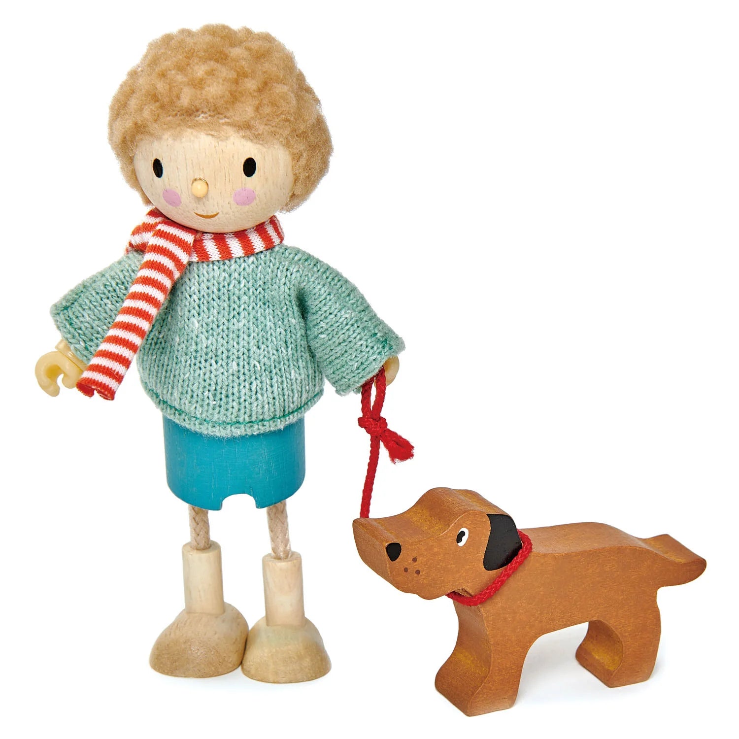 Wooden toy figure with a striped scarf and a wooden dog on a white background