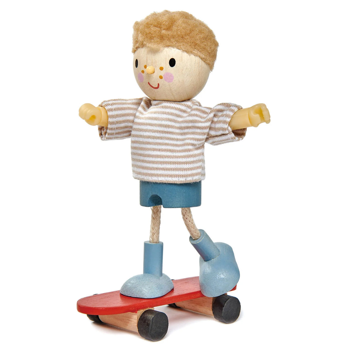 Toy figure of a child on a skateboard with a white background