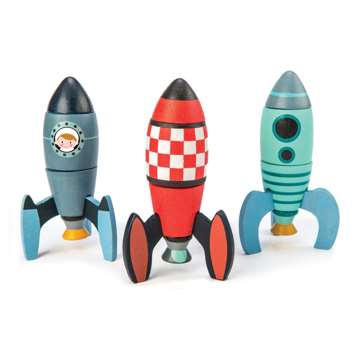 Three colorful toy rockets on a white background