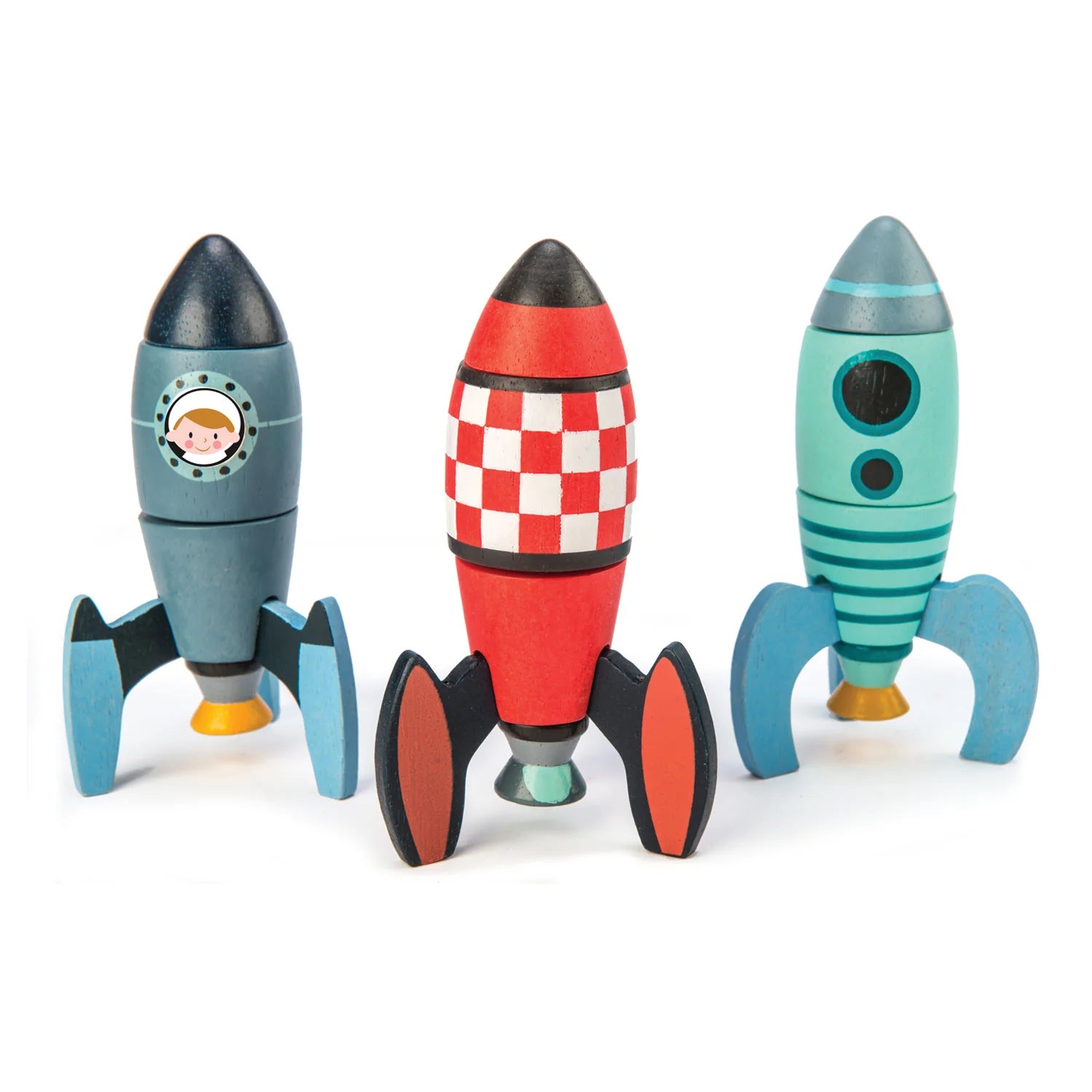 Three colorful toy rockets on a white background
