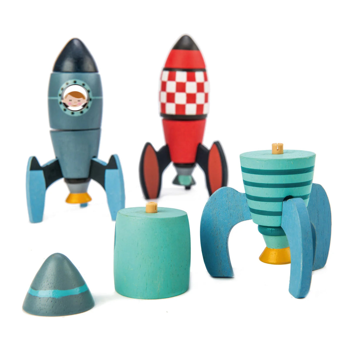 Set of colorful wooden toy rockets on a white background