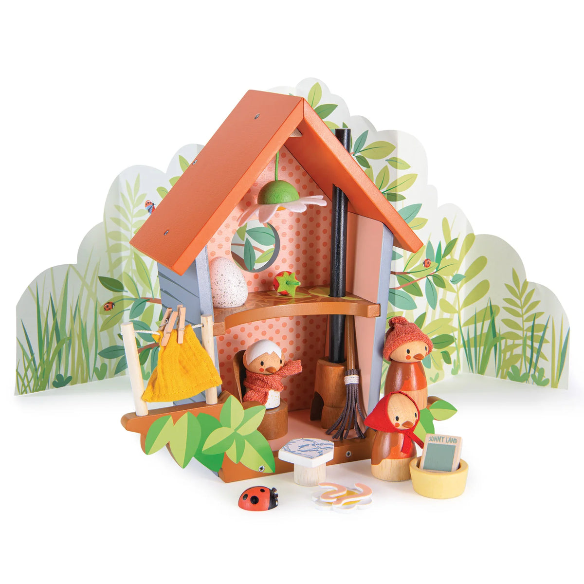 Wooden toy set with a small house and characters on a white background