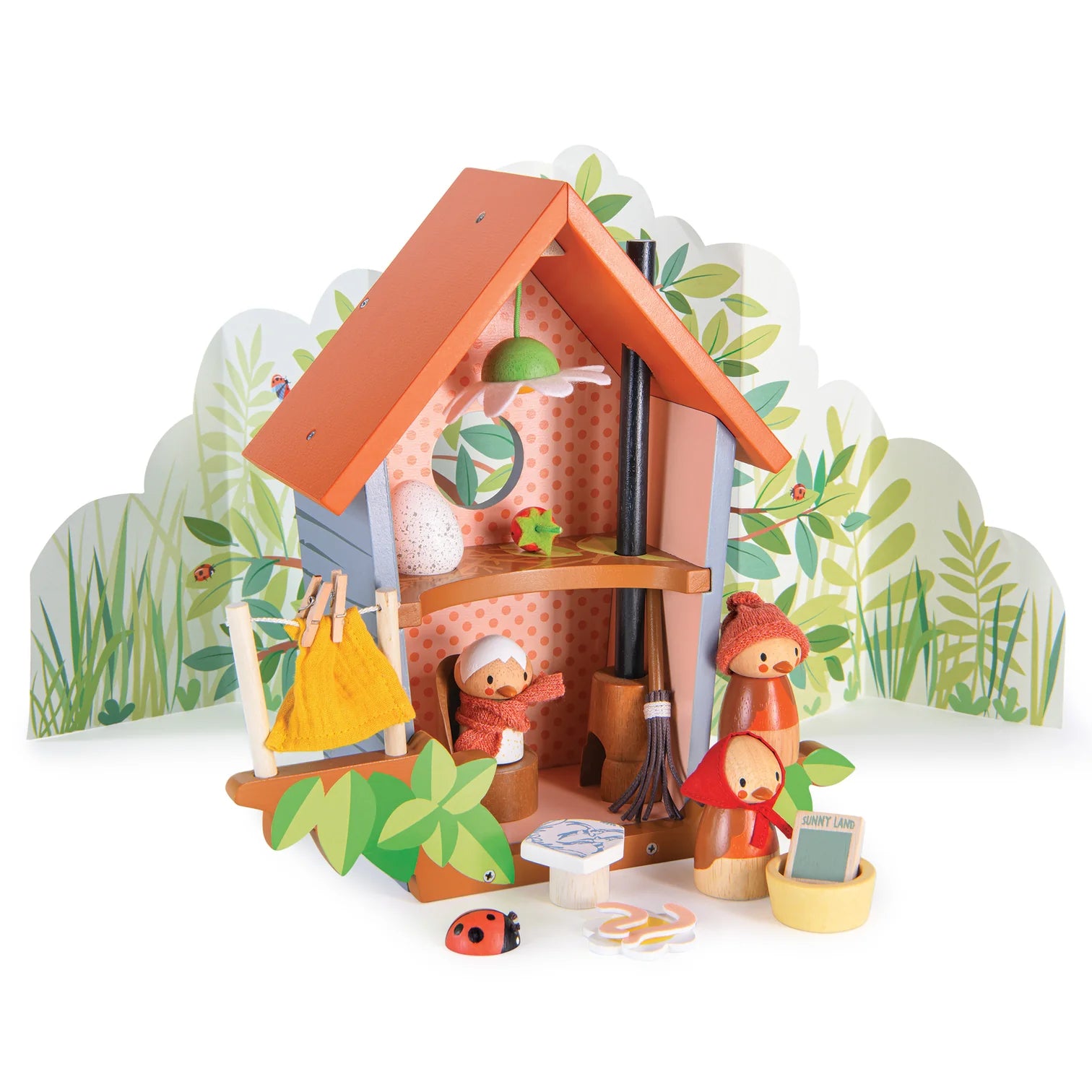 Wooden toy set with a small house and characters on a white background
