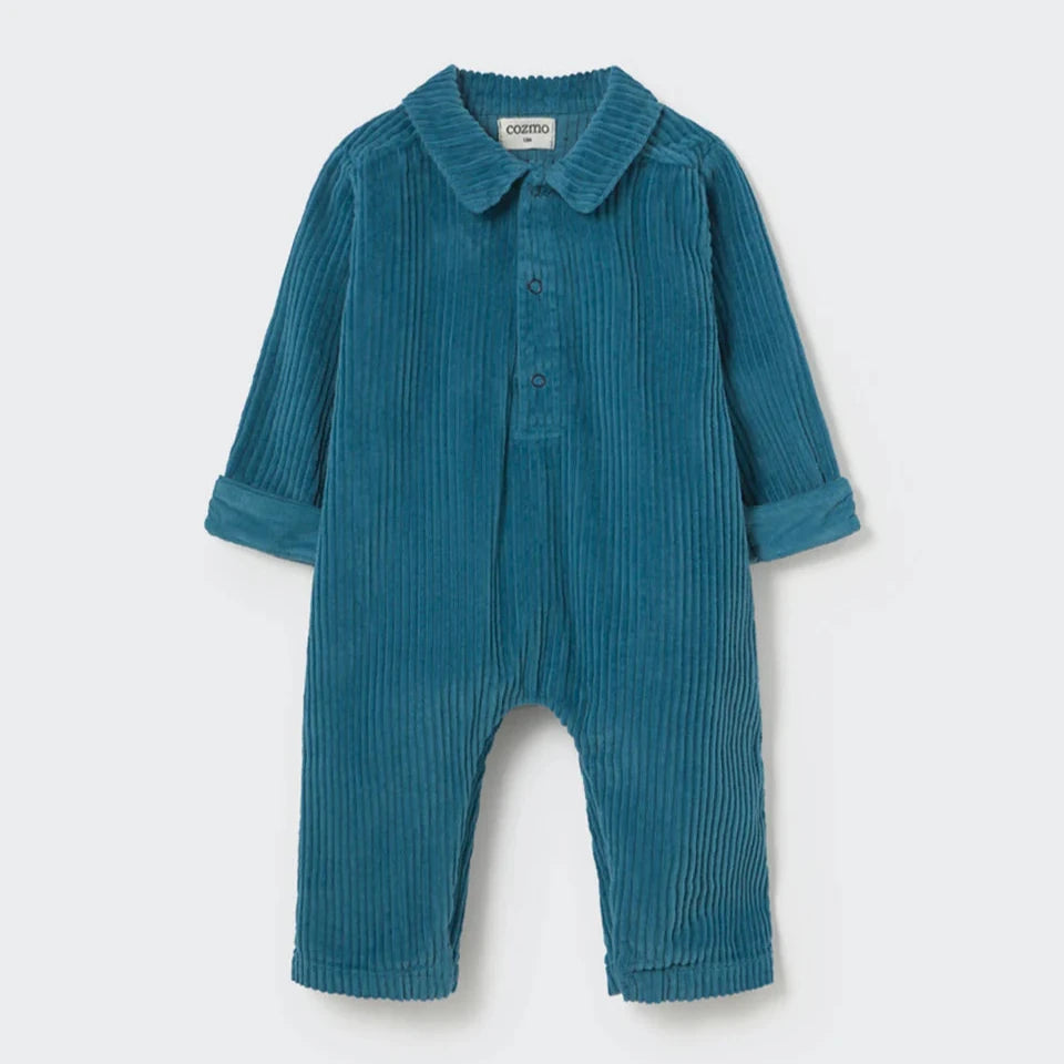 Blue baby romper with collar on a light gray background