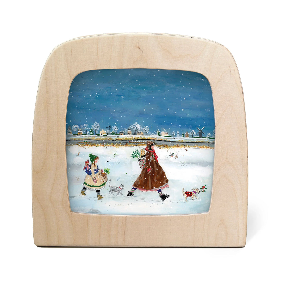 A square wooden picture frame with rounded corners, showcasing a hand-painted winter scene of two people walking in the snow with a dog and cat. The frame is photographed on a clean white background.
