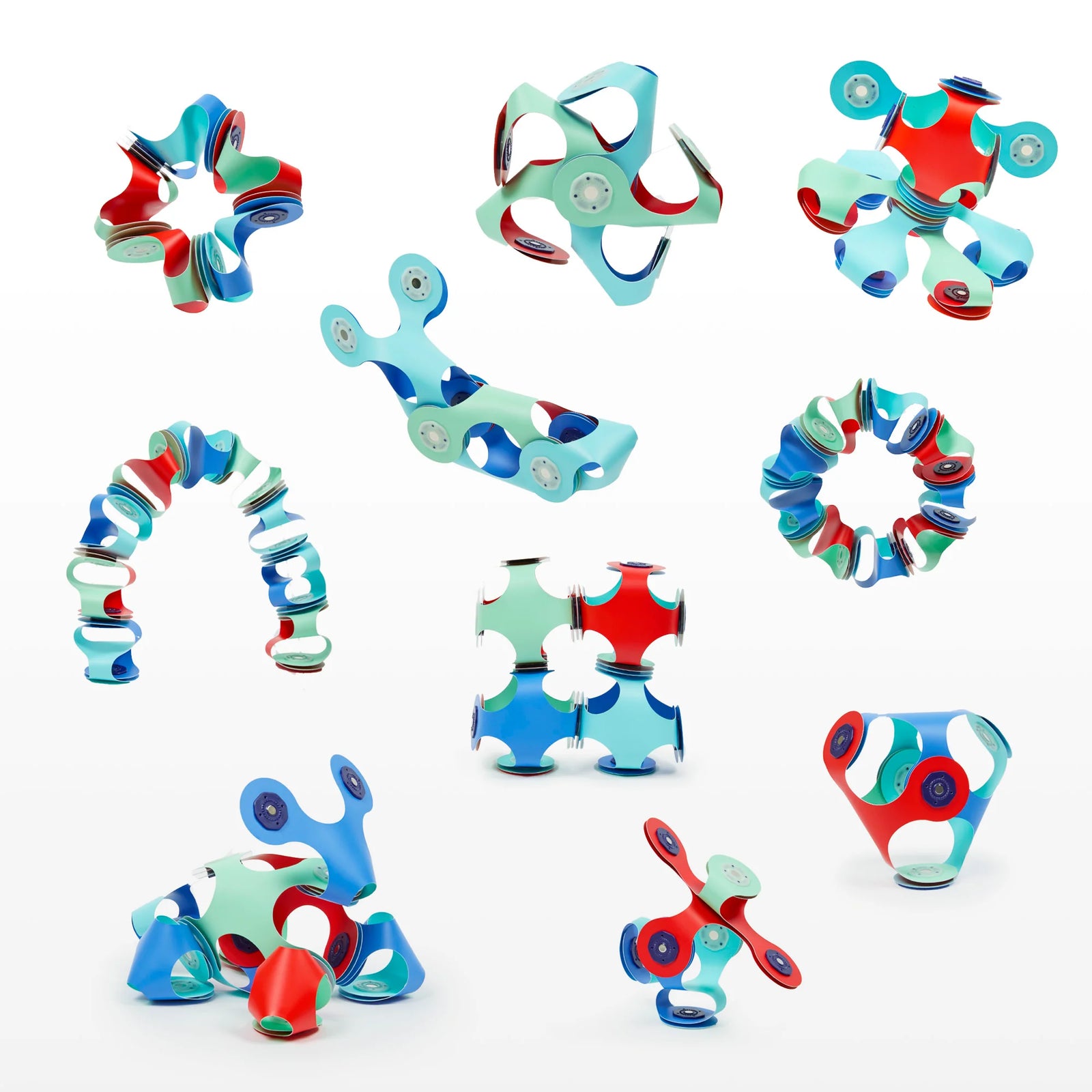 Clixo toy packaging with colorful magnetic pieces on a white background