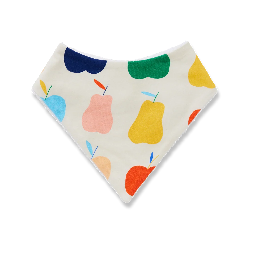 A triangular baby bandana bib with a white base and a colorful pattern of stylized fruits including pears, apples, in shades of yellow, orange, green, blue, and pink.