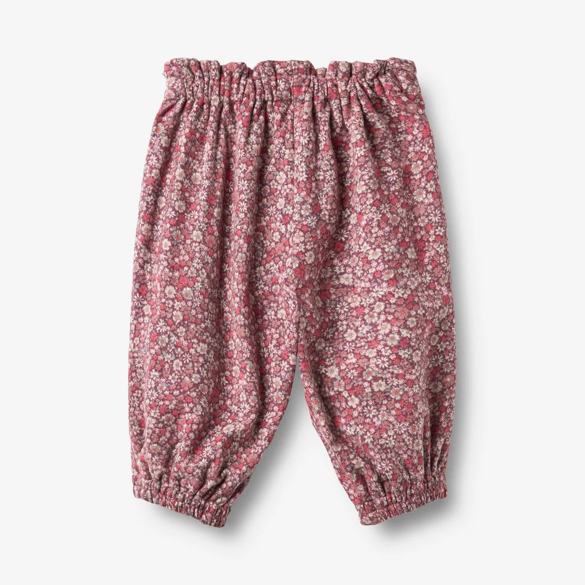 A pair of baby/toddler elastic-waist and elastic-calf pants in a dusty rose and pink floral print, shown flat on a white background.
