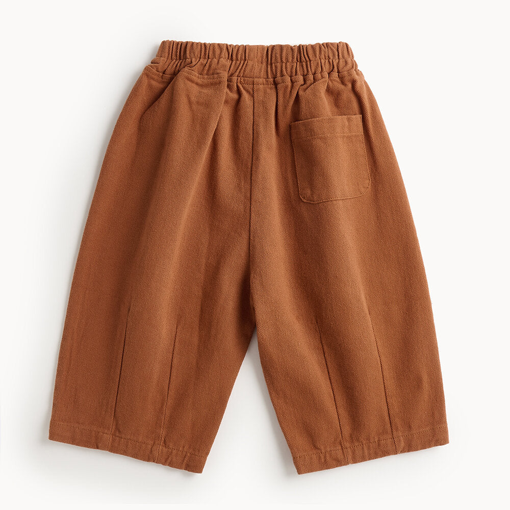 Brown pants with an elastic waistband on a white background