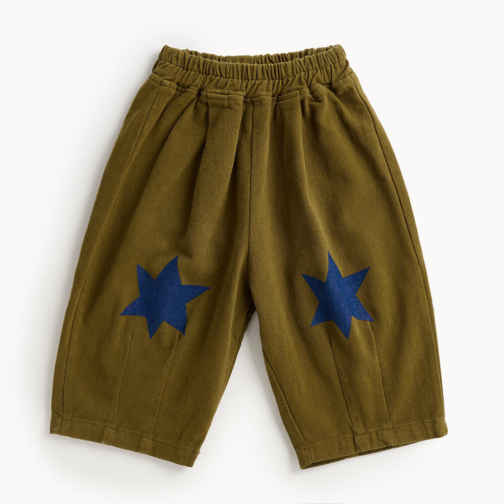 Green pants with blue stars on a white background