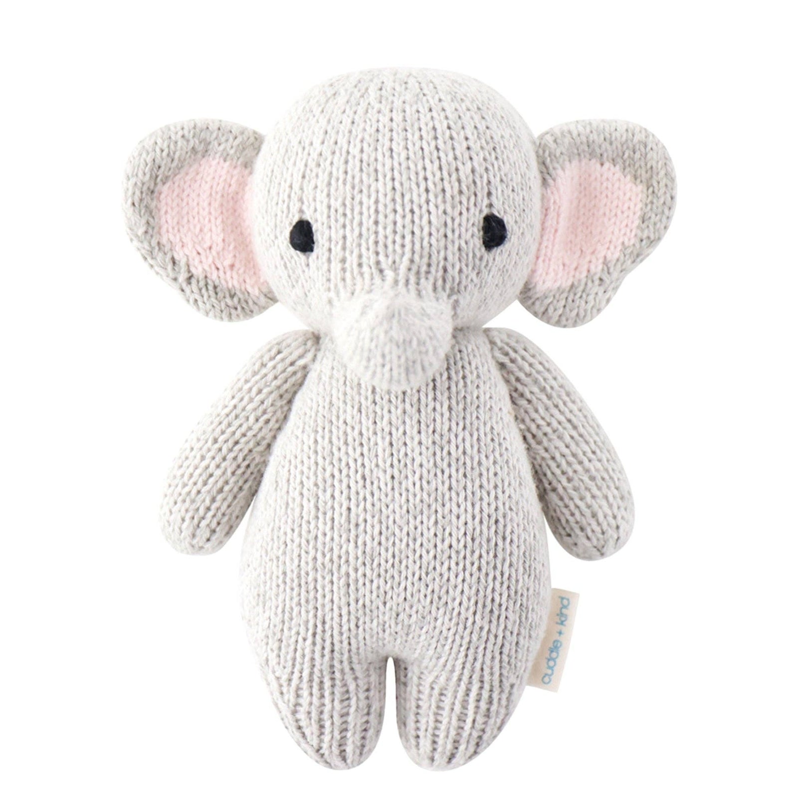 Knitted elephant toy with pink inner ears on a white background