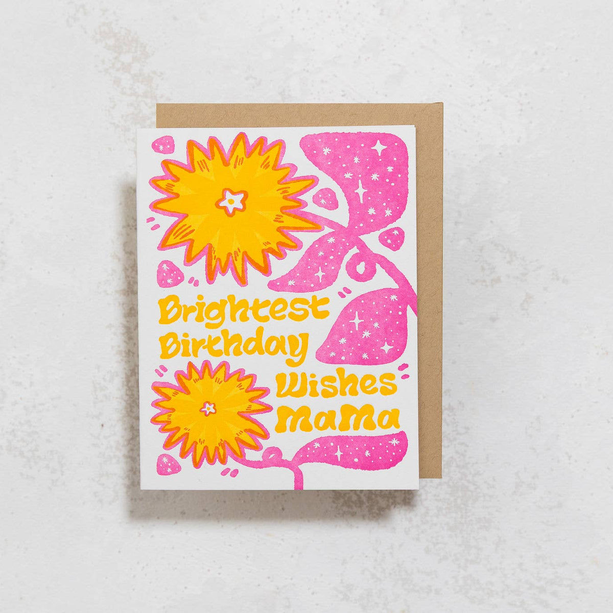A square birthday card with a kraft envelope, featuring a retro design with pink and orange flowers and the text 'Brightest Birthday Wishes Mama' on a light gray textured background.