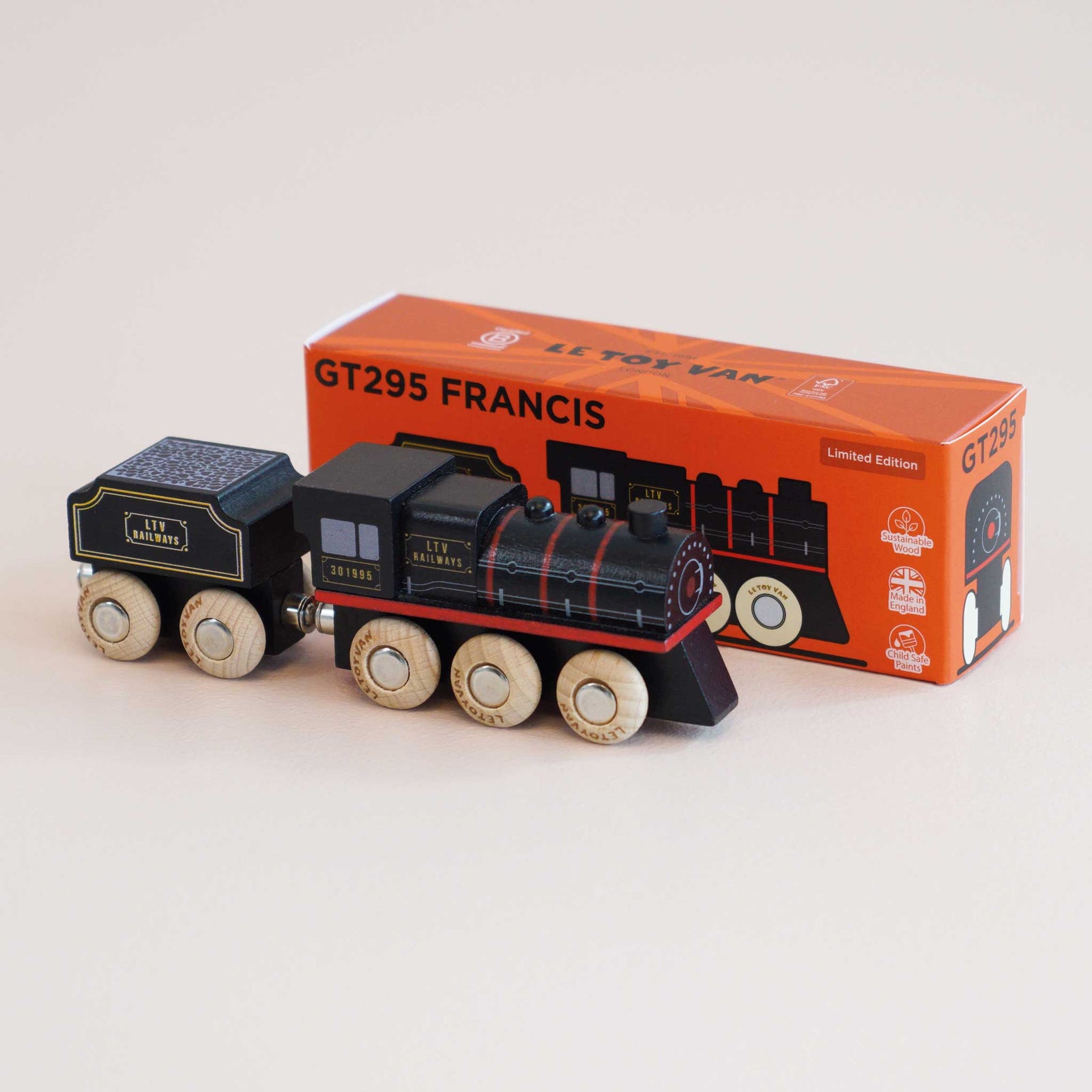 Toy train model on top of its packaging box with 'GT295 Francis' branding.
