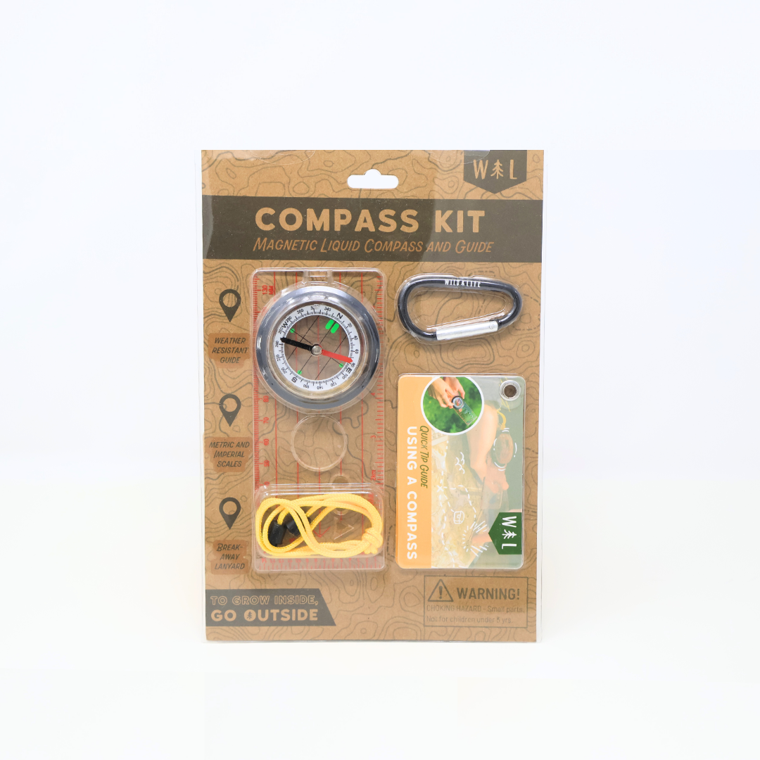 Compass kit with magnetic liquid compass and carabiner in packaging on a white background
