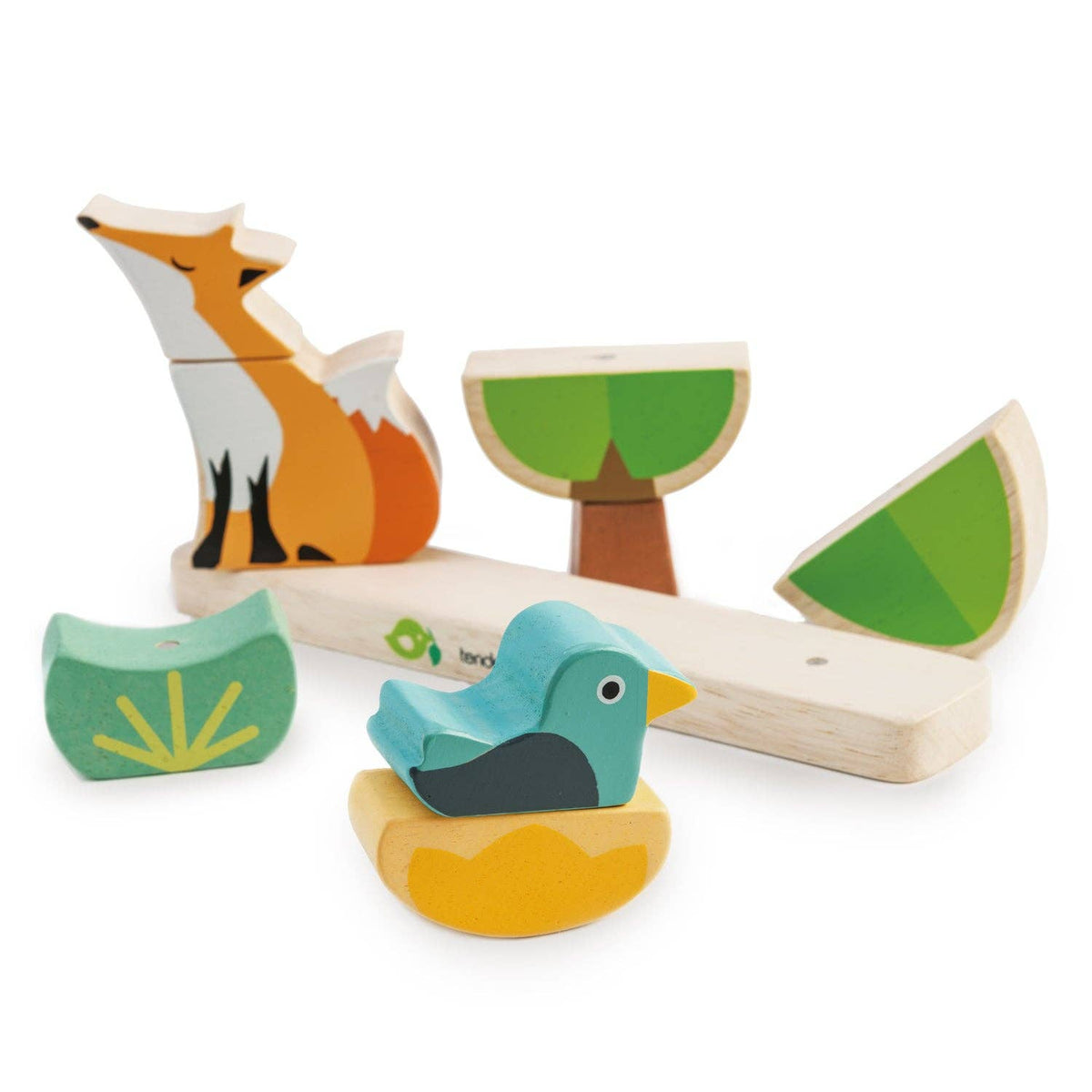Wooden toy set with fox, bird, and tree pieces on a white background