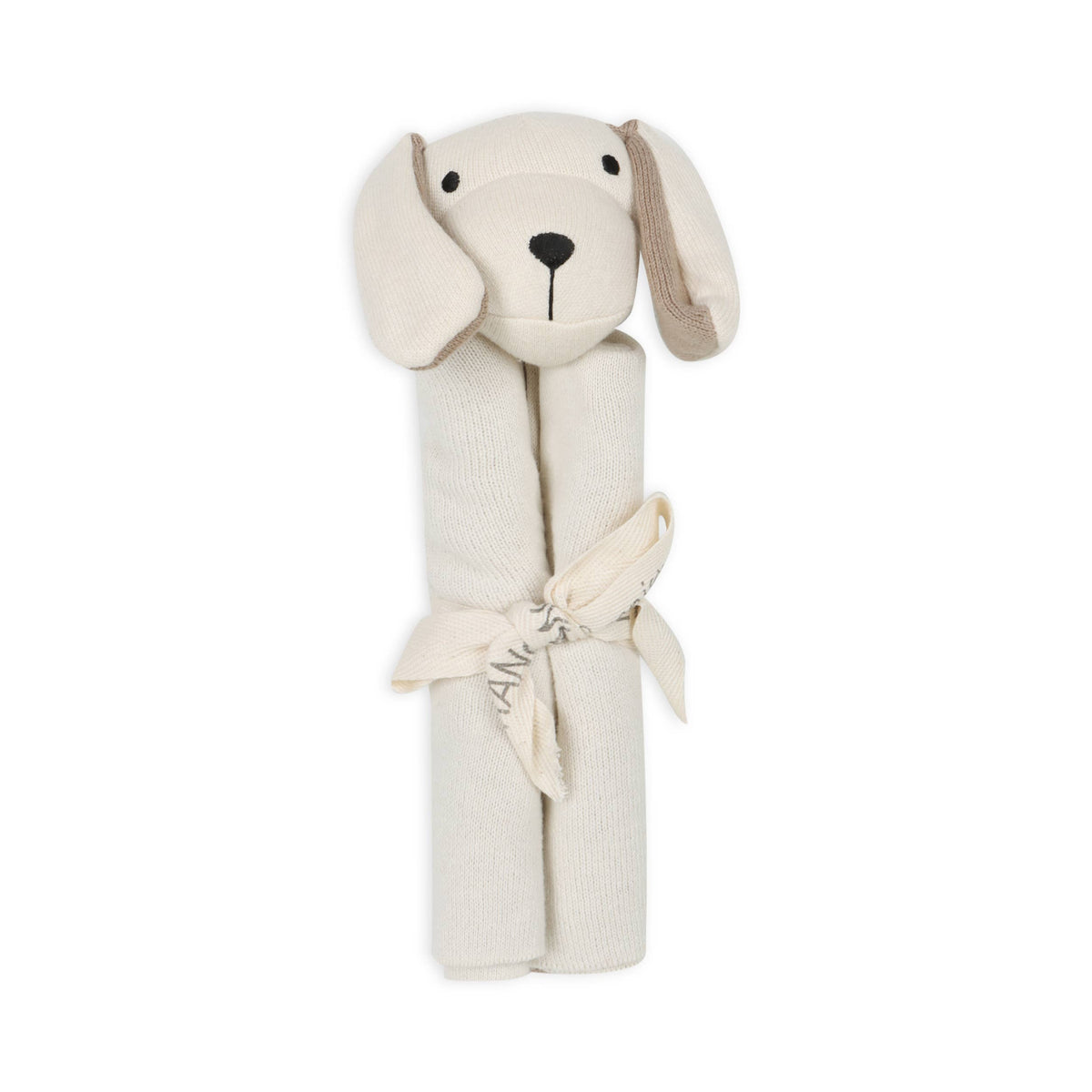 Dog-shaped plush toy wrapped in a blanket on a white background