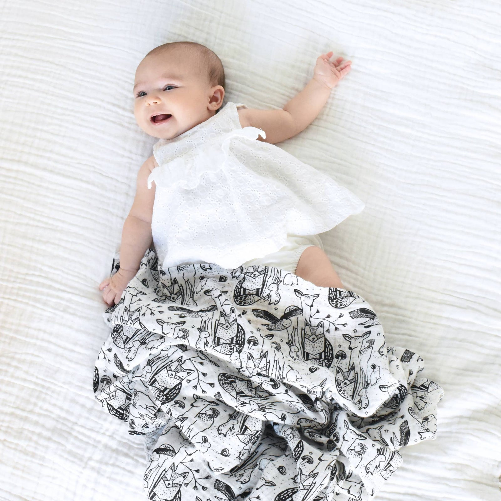 Forest animal print swaddle
