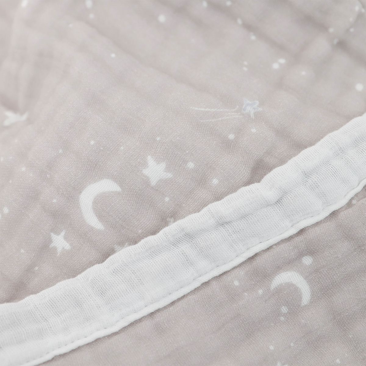 Gray fabric with white crescent moon and star patterns