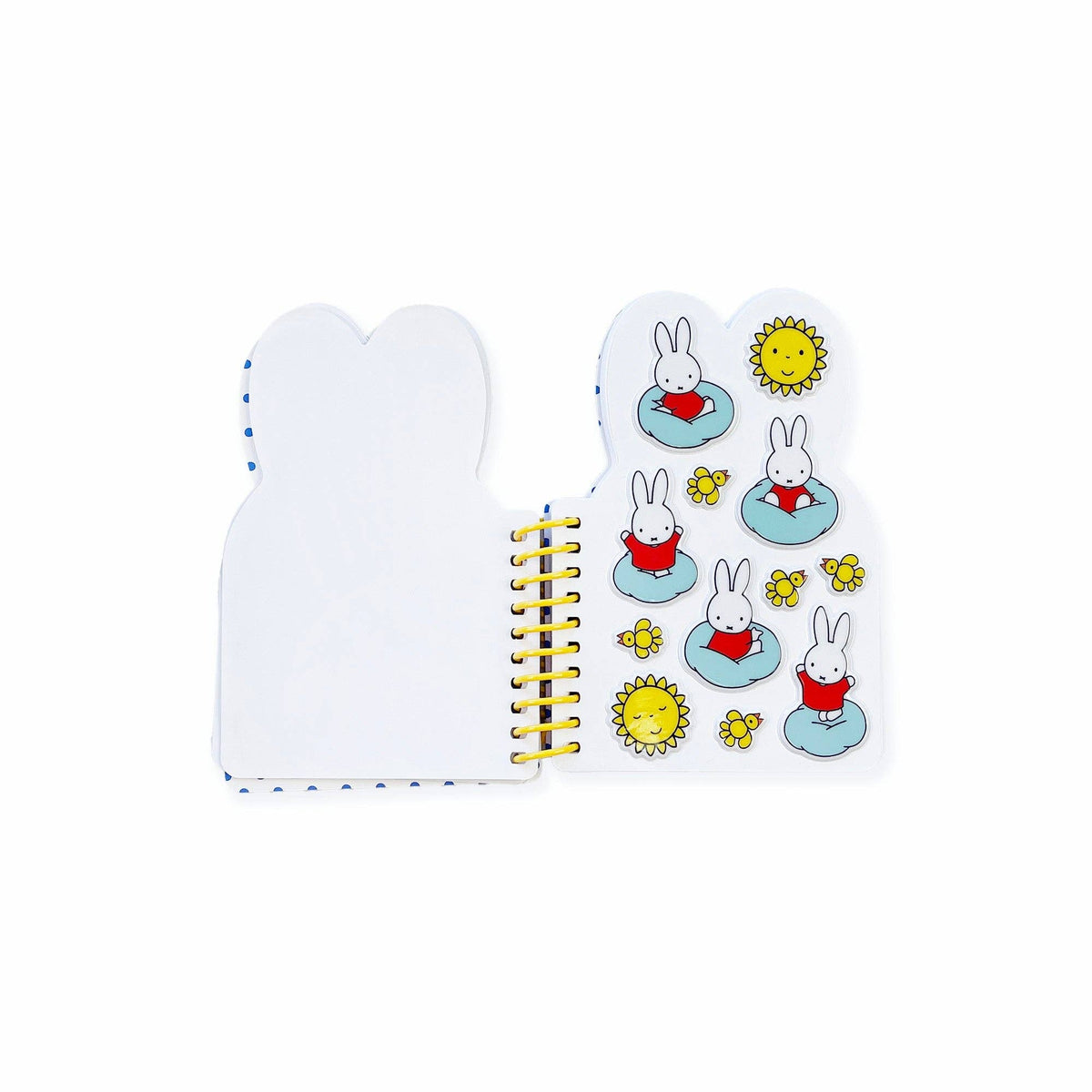 Small notebook with cartoon rabbit illustrations on a white background