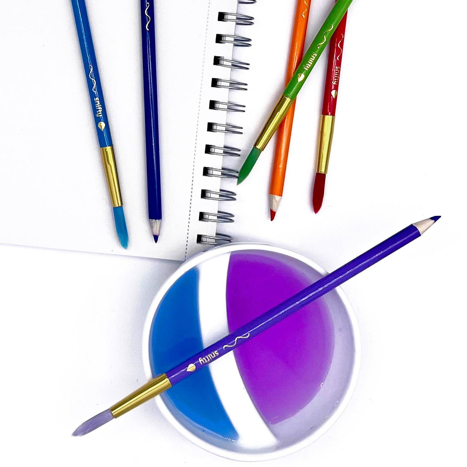 Set of 12 Colorbrush watercolor pencils and paintbrushes in a packaging on a white background