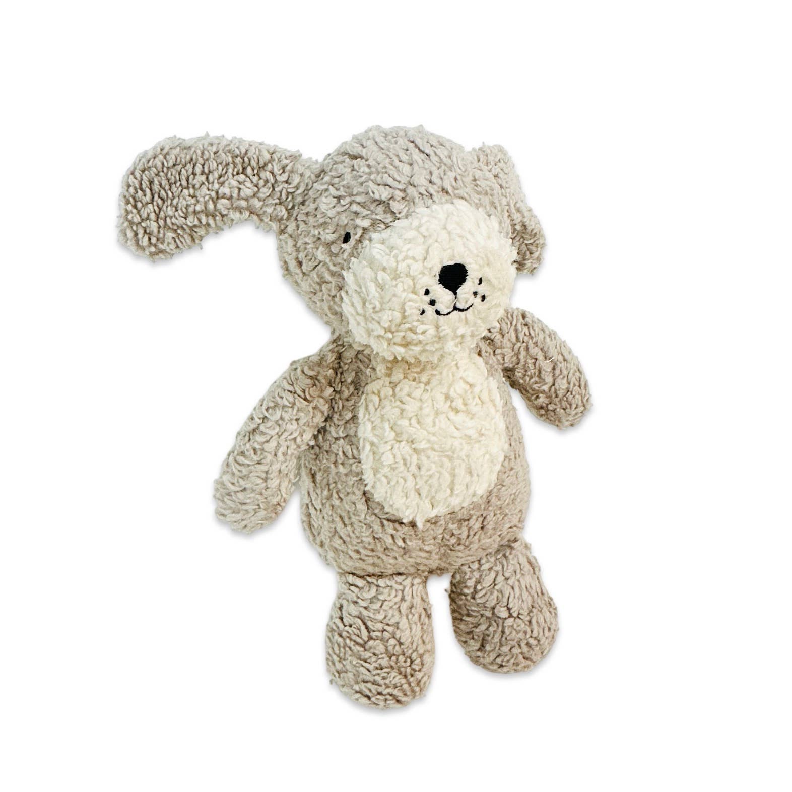 Plush toy dog with a white face and brown body on a white background