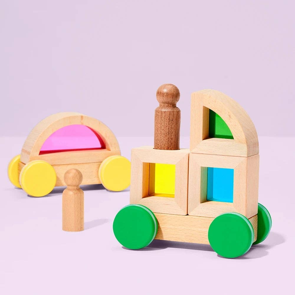 Wooden toy with colorful blocks on a light purple background