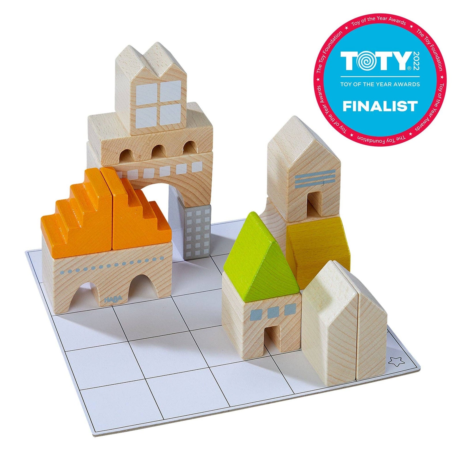 Wooden building blocks on a white surface with TOTY Toy of the Year Awards Finalist badge.