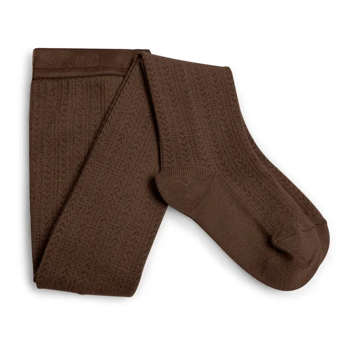 Brown textured tights on a white background