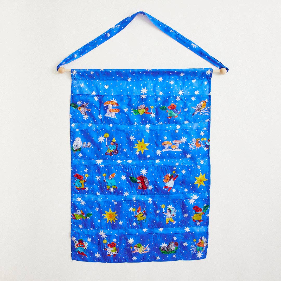 Children's advent calendar character pattern on a blue background