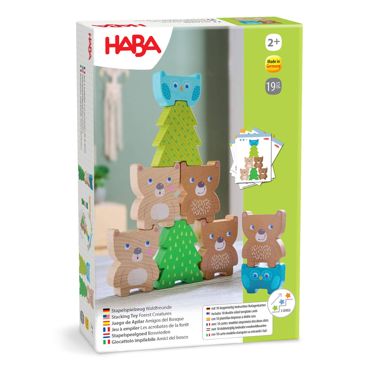 HABA toy packaging with wooden animal figures and cards on a white background