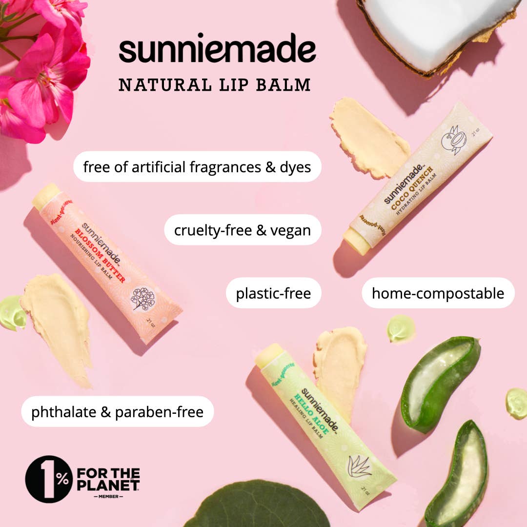 Sunniemade natural lip balm with product packaging and ingredients on a pink background