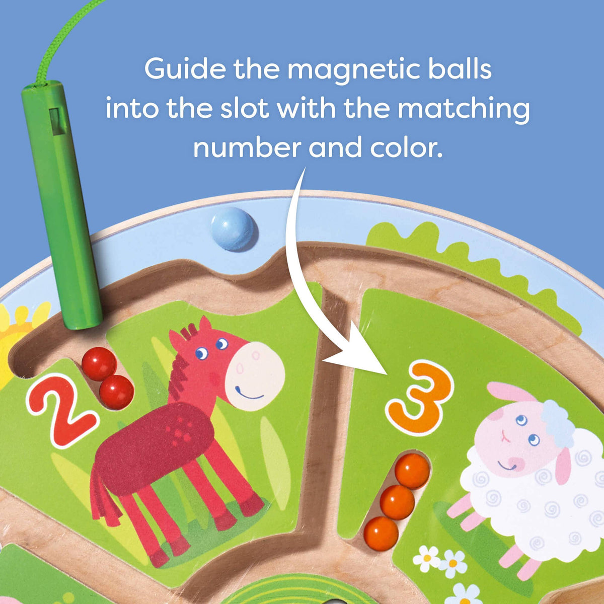 Educational toy with magnetic balls and animals on a blue background