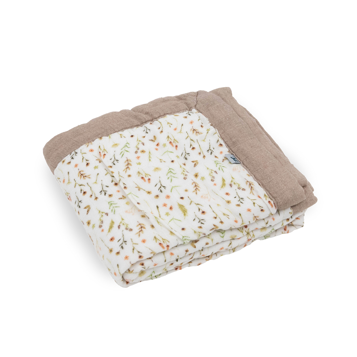 A folded baby blanket featuring a white background with a delicate, muted floral and botanical print in soft green, orange, and brown, finished with a solid taupe-brown border.