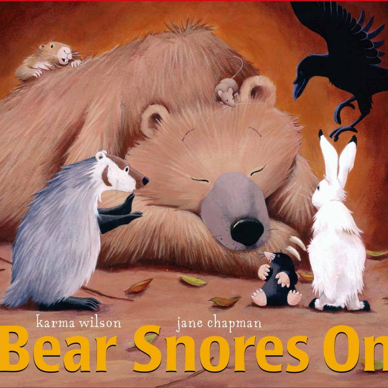 Book cover of 'Bear Snores On' with a bear and various animals around it.