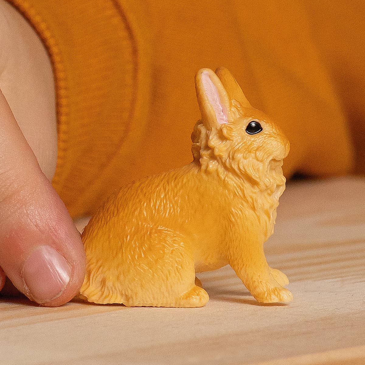 Toy rabbit figure on a white background
