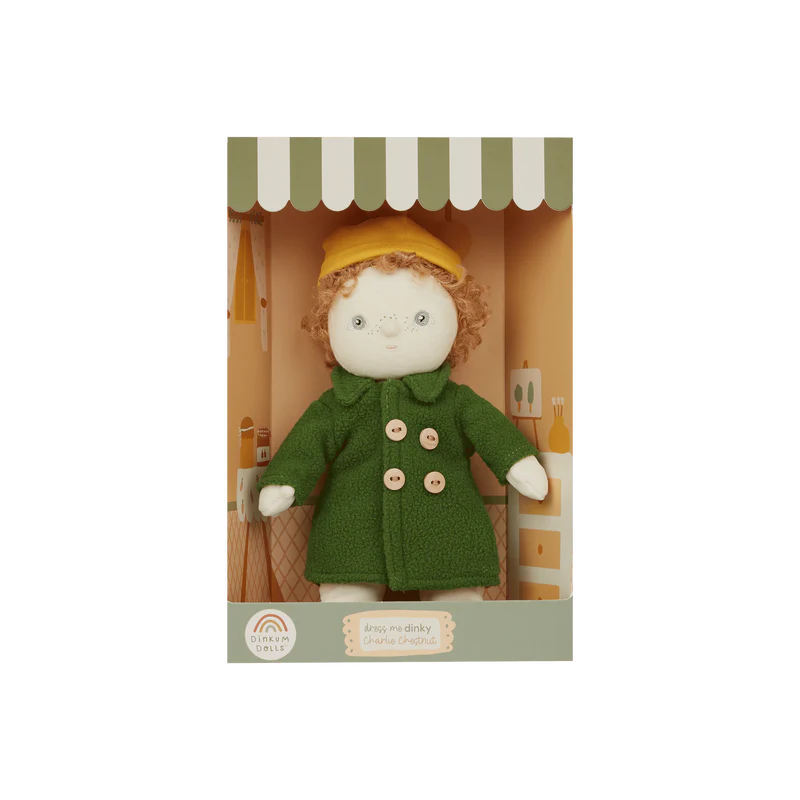 Child holding a doll with a checkered background