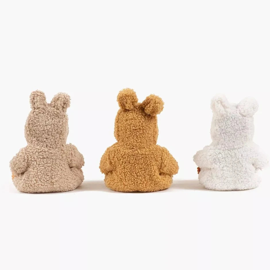 Three dolls wearing animal-themed outfits on a white background