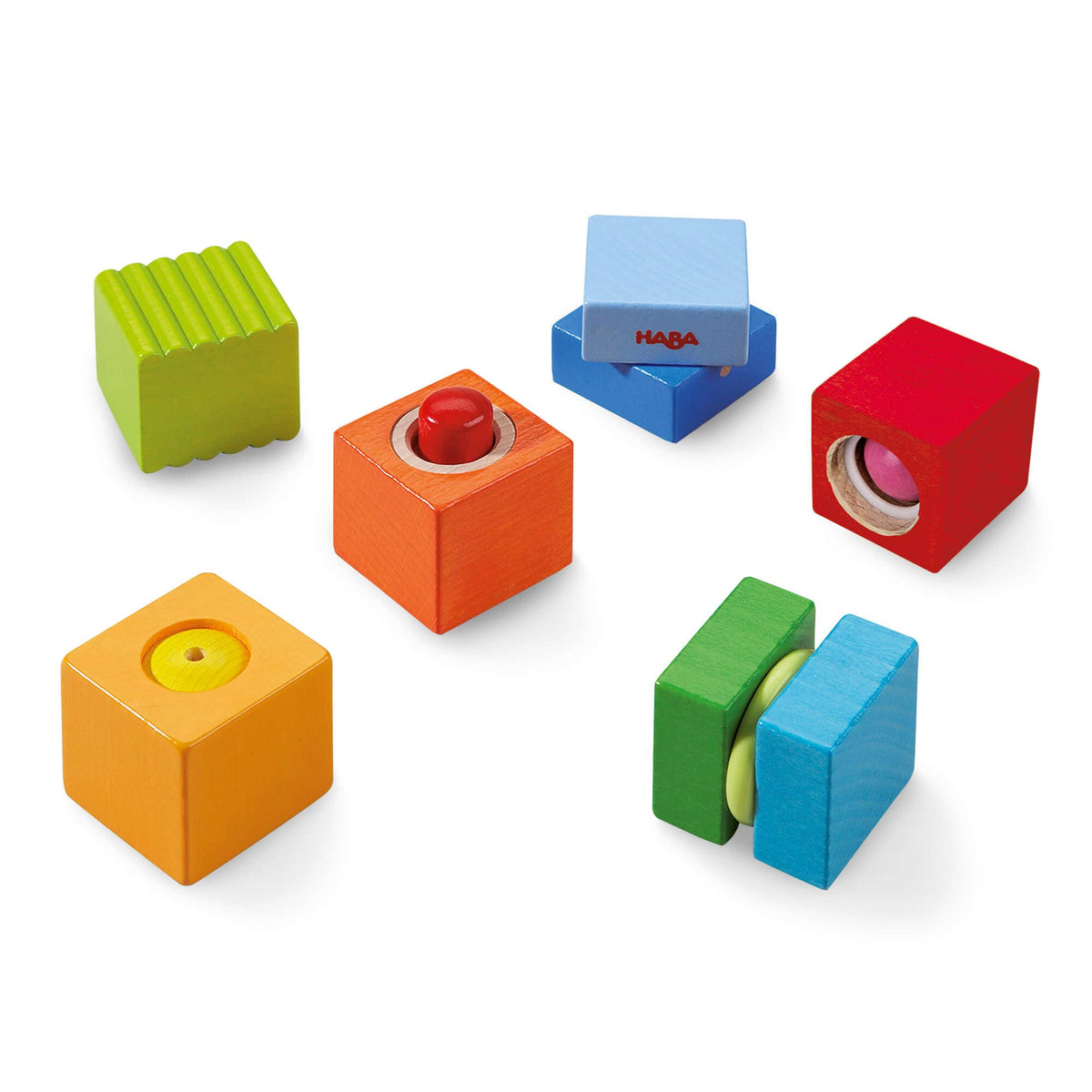 Colorful toy blocks with different shapes and a HABA logo on a white background